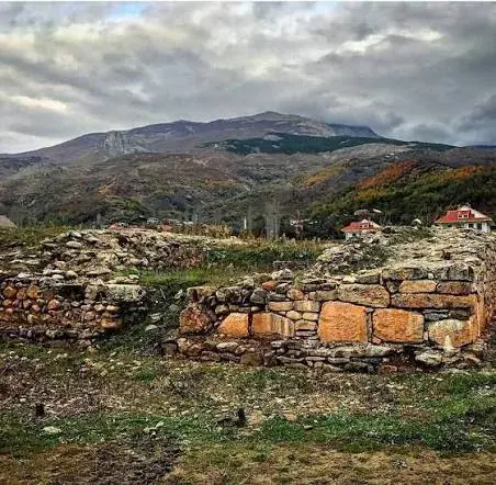 Grazhdan Castle – fortification with the mountain backdrop